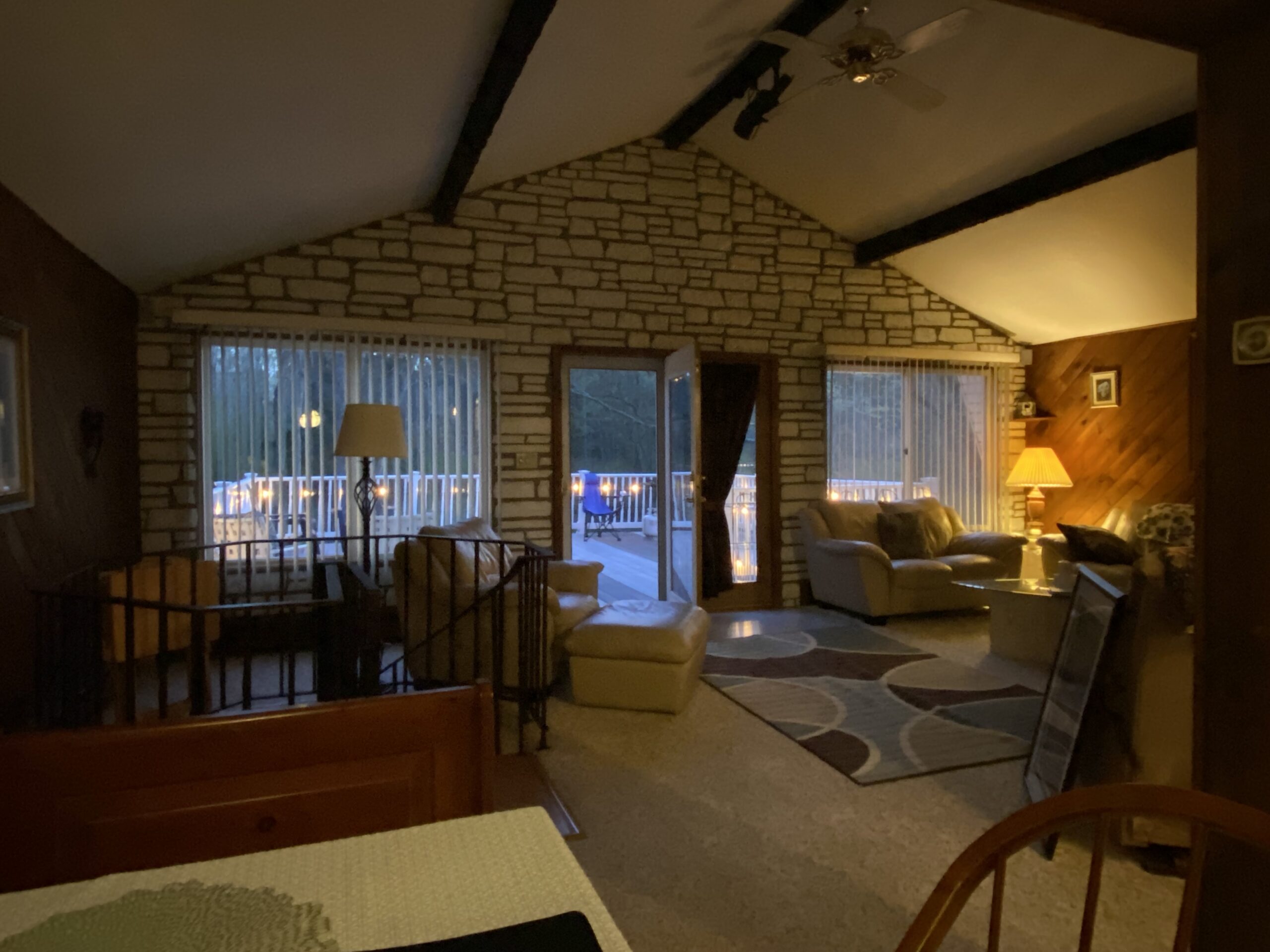 Karbelle Cabin family room big deck view at night